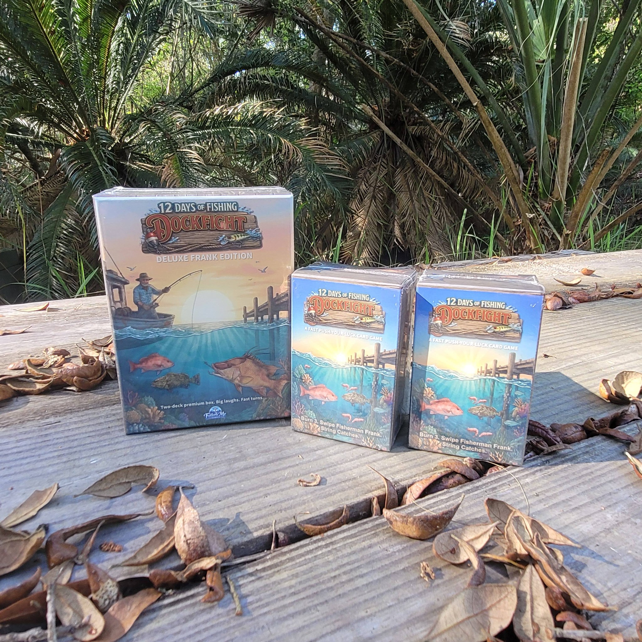 Dock Fight Deluxe Frank Edition premium box with two standard card boxes photographed outdoors